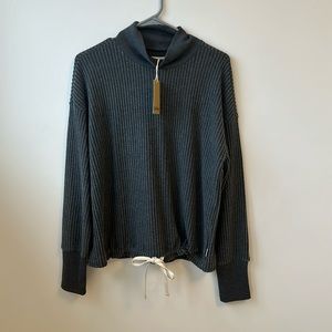 Up West Dark grey, mock neck, ribbed shirt with tie waist.